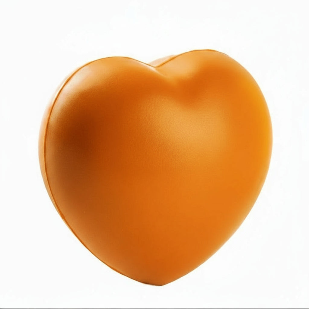 Orange heart-shaped object on a white background